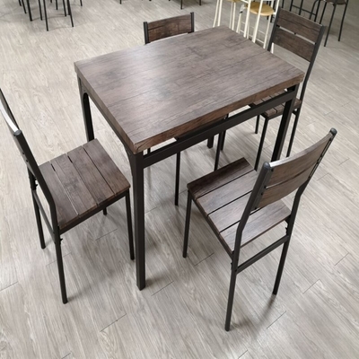 Il tavolo da pranzo nero di legno domestico ha messo 4 sedie di Seater con la struttura del metallo